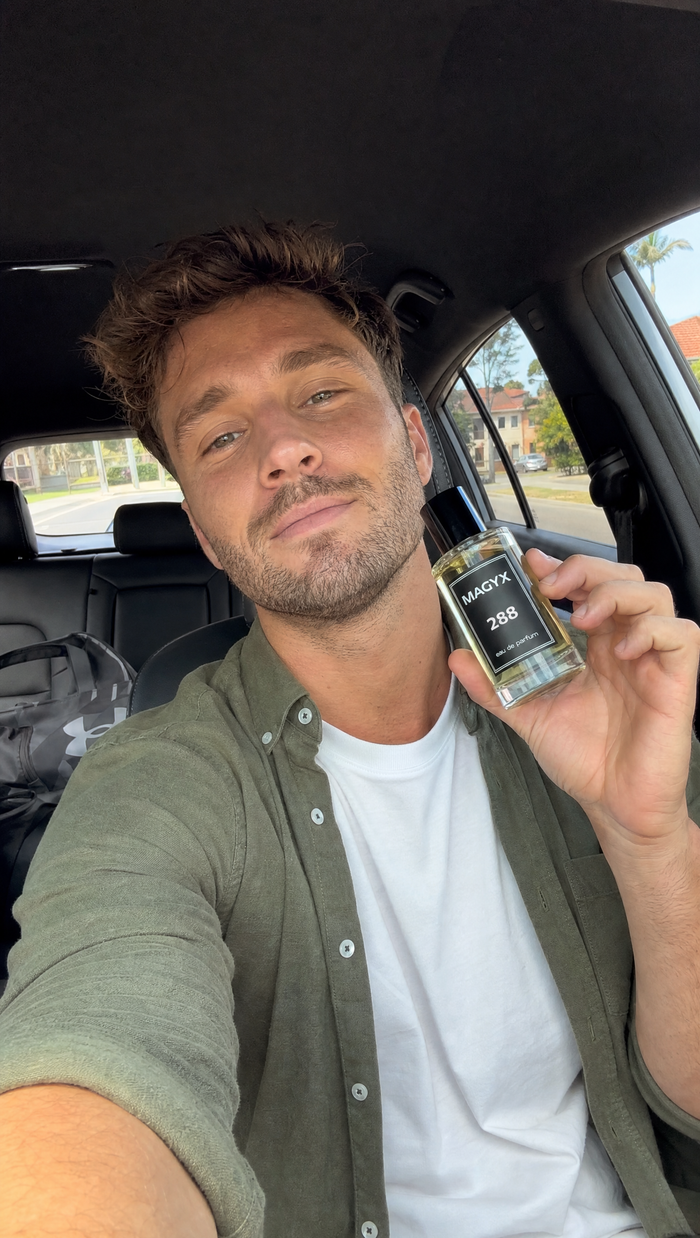 Official Magyx customer photo holding No. 288 perfume